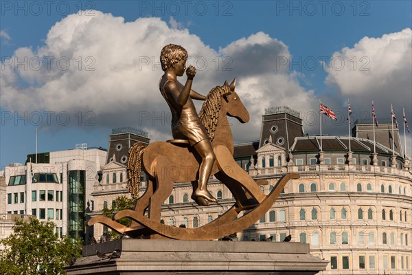 Bronze boy on a rocking horse by Elmgreen & Dragset