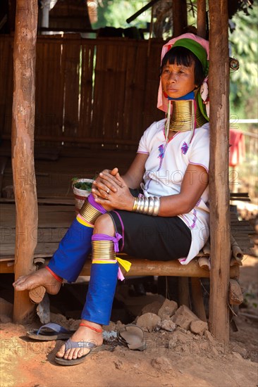 Long-necked Padaung woman wearing neck rings