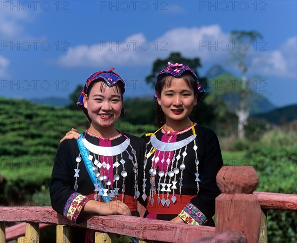 Young Miao women wearing traditional ethnic costumes