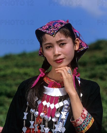 Young Miao woman wearing a traditional ethnic costume