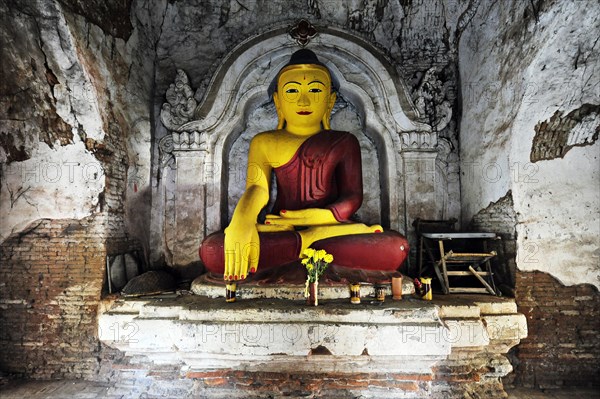Old Buddha in a temple in Amarapura