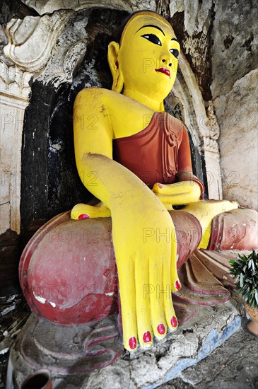 Old Buddha in a temple in Amarapura