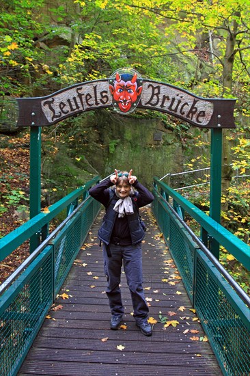 Woman standing on Teufelsbruecke