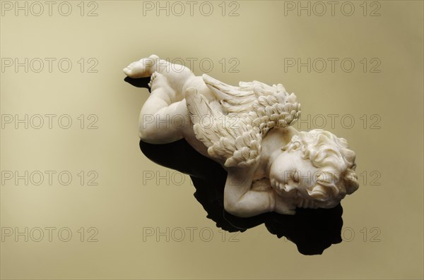 Porcelain angel sleeping