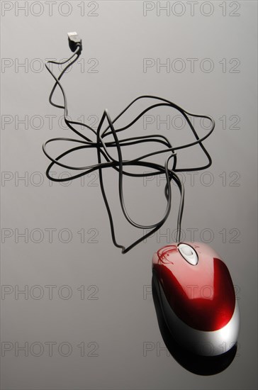 Computer mouse with a cluttered USB cable