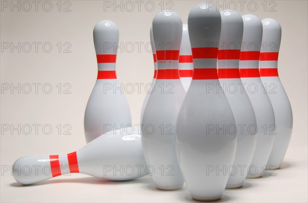 Set up bowling pins with one fallen over