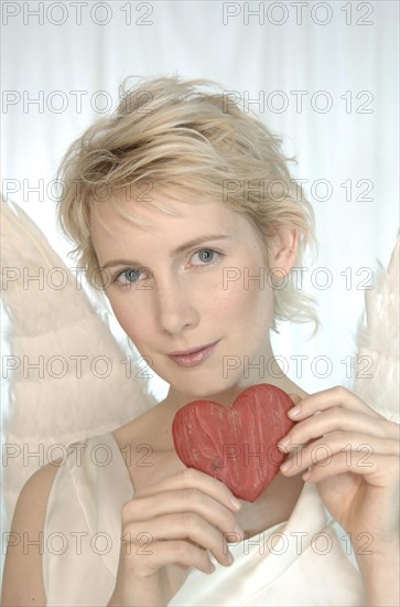 Blonde woman with angel wings