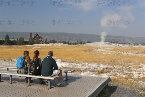 Tourists waiting for the eruption of Old Faithful