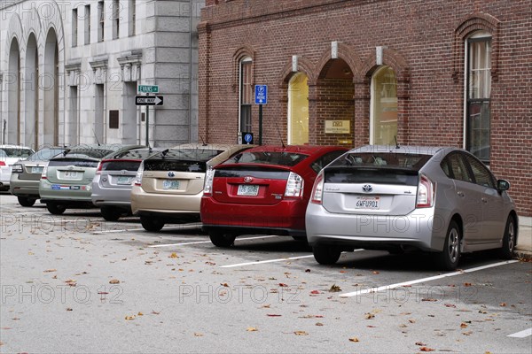 Row of Toyota Prius hybrid vehicles