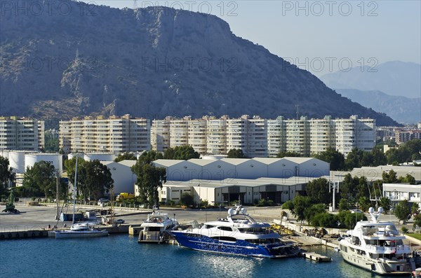 View of the container port of Antalya with the town of Antalya