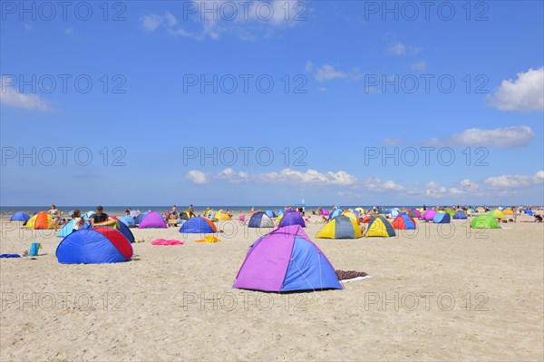 Colorful wind screens on the beach of St. Peter-Ording