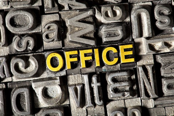 Old lead letters forming the word OFFICE