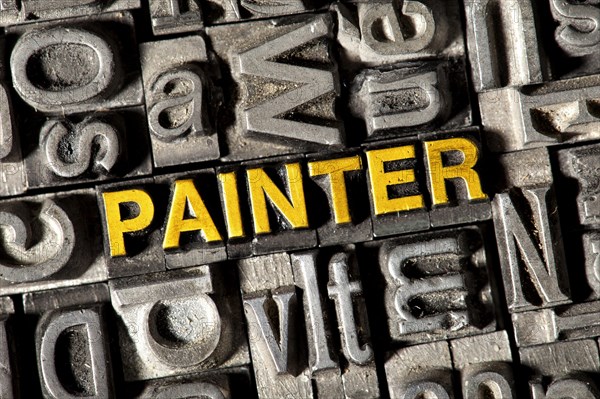 Old lead letters forming the word PAINTER