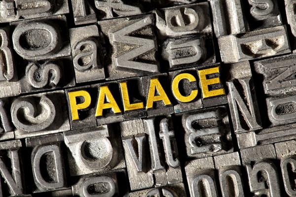 Old lead letters forming the word PALACE