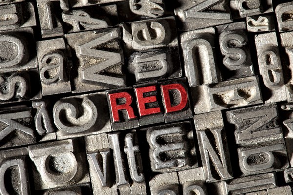 Old lead letters forming the word RED in red letters - Photo12 ...