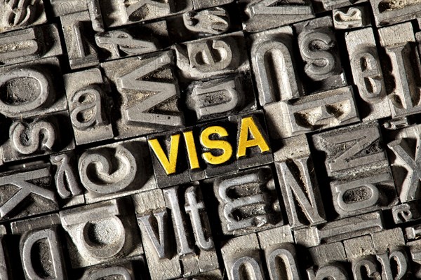 Old lead letters forming the word Visa