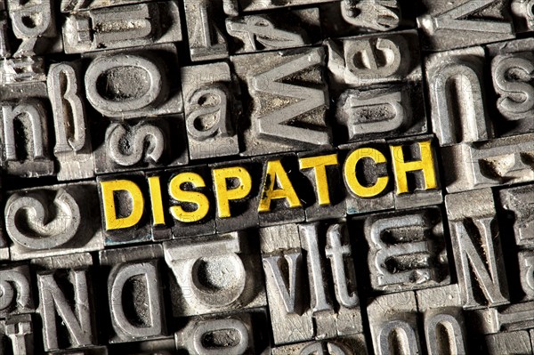 Old lead letters forming the word Dispatch