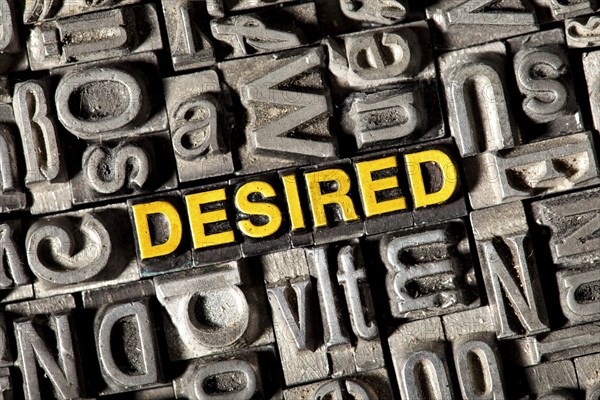 Old lead letters forming the word Desired