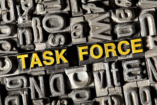 Old lead letters forming the words Task Force