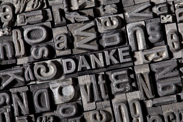 Old lead letters forming the word DANKE