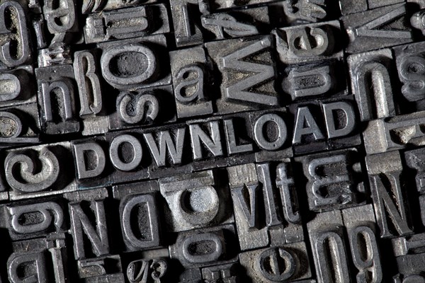 Old lead letters forming the word DOWNLOAD
