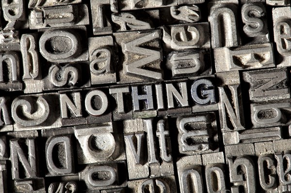 Old lead letters forming the word NOTHING