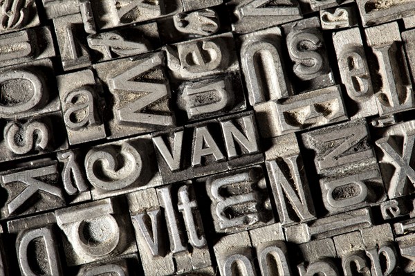 Old lead letters forming the word VAN