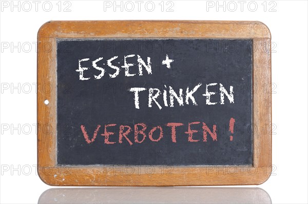 Old school blackboard with the words ESSEN + TRINKEN VERBOTEN!