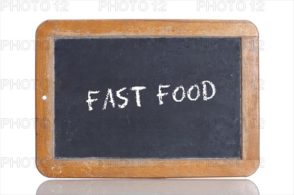Old school blackboard with the words FAST FOOD