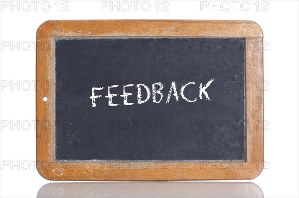 Old school blackboard with the word FEEDBACK