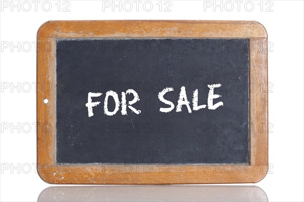 Old school blackboard with the words FOR SALE