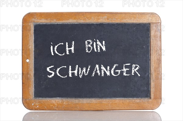 Old school blackboard with the words ICH BIN SCHWANGER