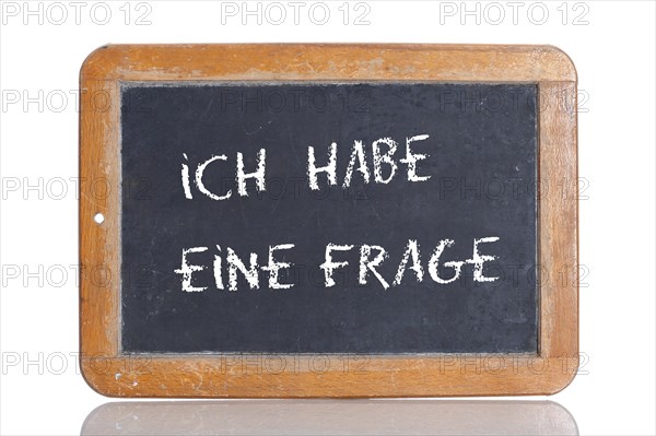 Old school blackboard with the words ICH HABE EINE FRAGE