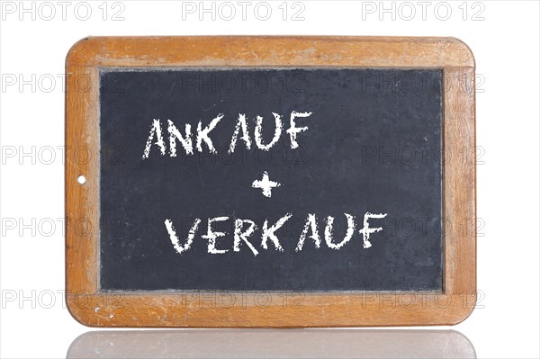 Old school blackboard with the words ANKAUF + VERKAUF