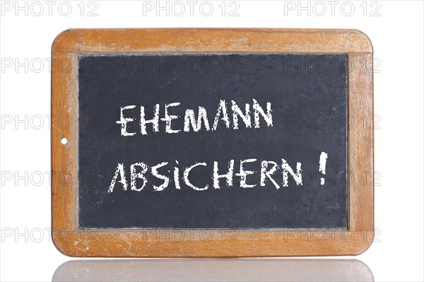 Old school blackboard with the words EHEMANN ABSICHERN!
