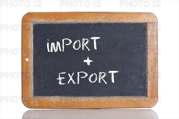 Old school blackboard with the words IMPORT + EXPORT