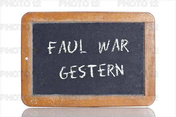 Old school blackboard with the phrase FAUL WAR GESTERN