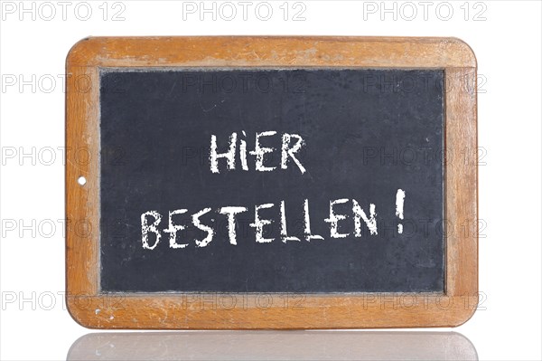Old school blackboard with the words HIER BESTELLEN!
