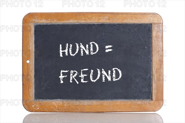 Old school blackboard with the words HUND = FREUND