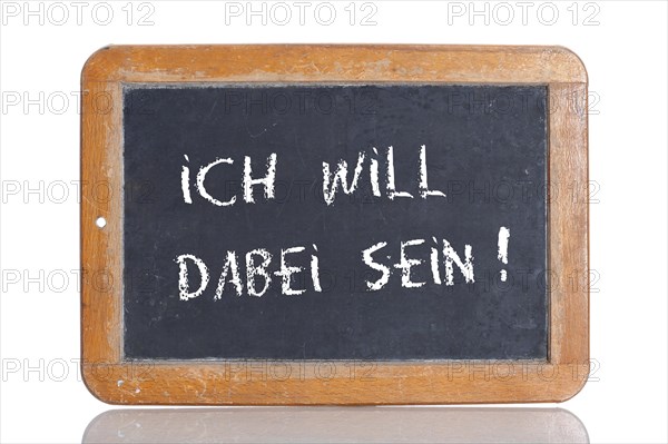 Old school blackboard with the words ICH WILL DABEI SEIN