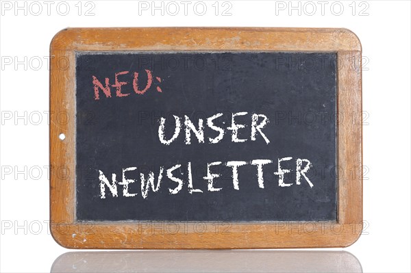 Old school blackboard with the words NEU: UNSER NEWSLETTER