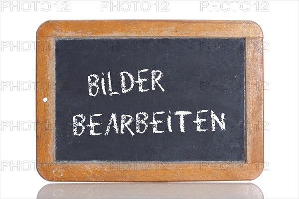 Old school blackboard with the term BILDER BEARBEITEN