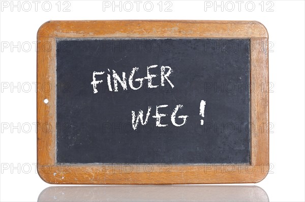 Old school blackboard with the term FINGER WEG!