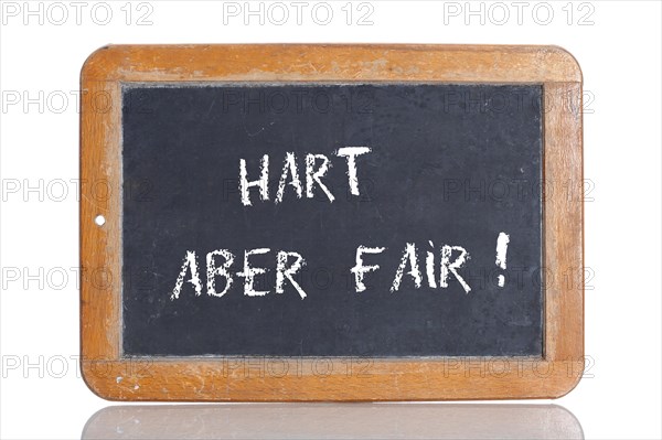 Old school blackboard with the term HART ABER FAIR