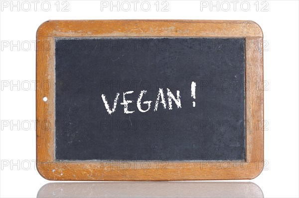 Old school blackboard with the term VEGAN