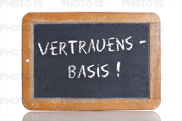 Old school blackboard with the term VERTRAUENSBASIS