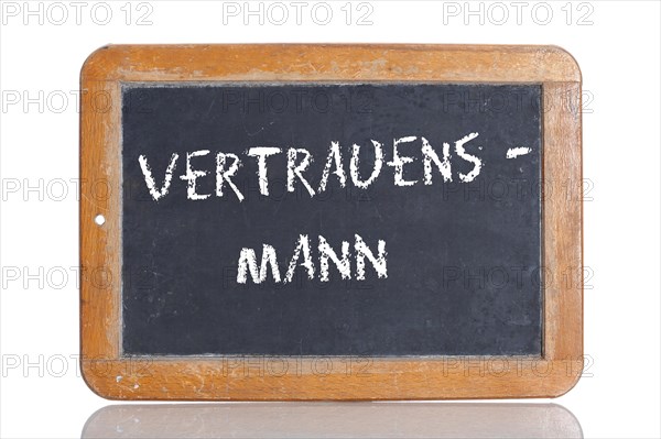 Old school blackboard with the term VERTRAUENSMANN