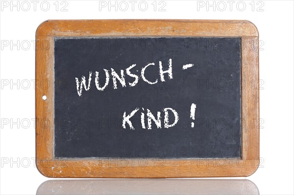 Old school blackboard with the term WUNSCHKIND