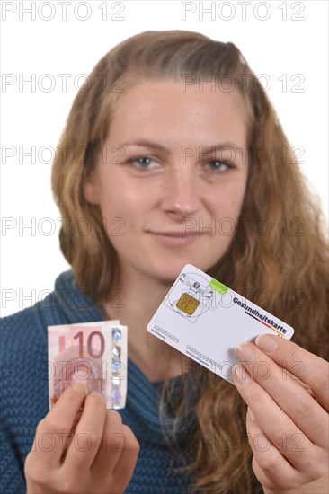 Woman holding a health insurance card and a 10 euro banknote