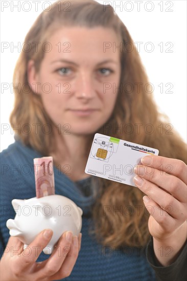 Woman holding a health insurance card and a 10 euro banknote